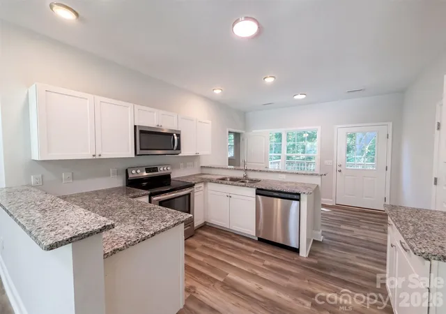 Photo 2 of Single family home for sale at 604 Stewart Ct, Statesville, NC 28677 | MLS# 4426413 | Listing updated on 2026-09-30