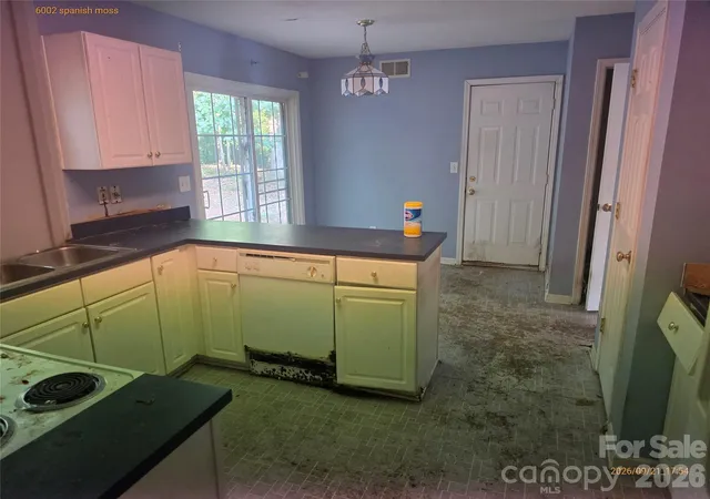 Photo 3 of Single family home for sale at 6002 Spanish Moss Ln, Charlotte, NC 28262 | MLS# 4426623 | Listing updated on 2026-09-22