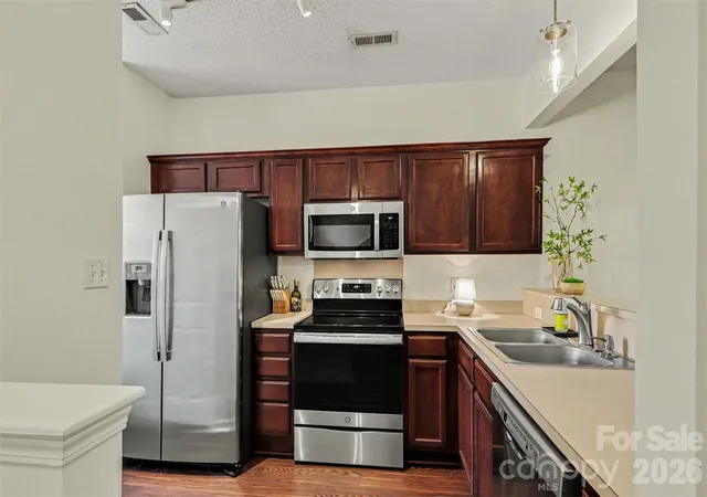 Photo 1 of Townhouse for sale at 9120 Treyburn Dr, Charlotte, NC 28216 | MLS# 4426772 | Listing updated on 2026-10-24