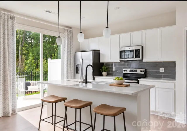 Photo 1 of Townhouse for sale at 9309 Widden Way, Charlotte, NC 28269 | MLS# 4427368 | Listing updated on 2026-09-29