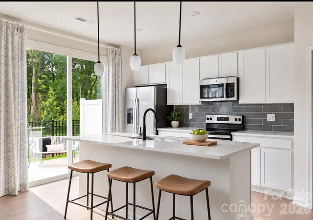Photo 2 of Townhouse for sale at 9309 Widden Way, Charlotte, NC 28269 | MLS# 4427368 | Listing updated on 2026-09-29