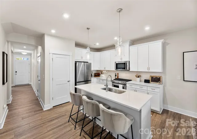 Photo 2 of Townhouse for sale at 9722 Munsing Dr, Charlotte, NC 28269 | MLS# 4427726 | Listing updated on 2026-10-05
