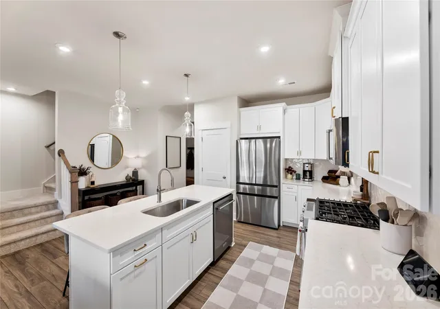 Photo 3 of Townhouse for sale at 9722 Munsing Dr, Charlotte, NC 28269 | MLS# 4427726 | Listing updated on 2026-10-05