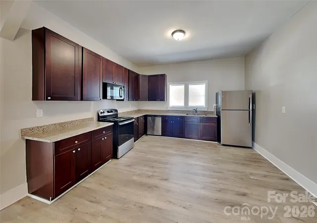 Photo 3 of Single family home for sale at 318 Bruce Ave, Mooresville, NC 28115 | MLS# 4428004 | Listing updated on 2026-09-24