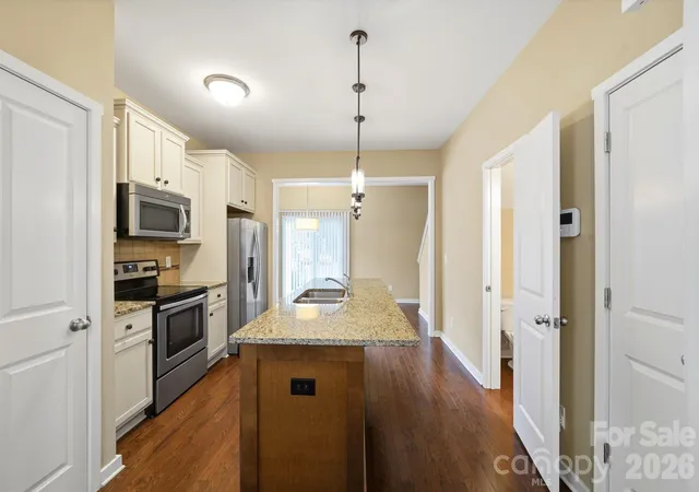 Photo 4 of Townhouse for sale at 12766 Livengood Ln, Charlotte, NC 28269 | MLS# 4428024 | Listing updated on 2026-10-07