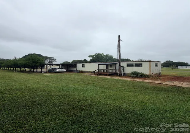 Photo 3 of Single family home for sale at 125 Deerfield Ln, Statesville, NC 28677 | MLS# 4428421 | Listing updated on 2026-09-28