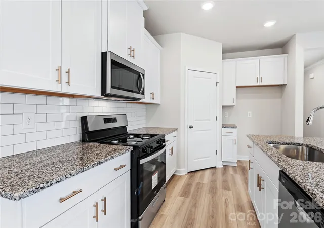 Photo 2 of Single family home for sale at 12531 Russellwood Ln, Charlotte, NC 28213 | MLS# 4428490 | Listing updated on 2026-10-16