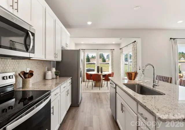 Photo 2 of Single family home for sale at 12644 Russellwood Ln, Charlotte, NC 28213 | MLS# 4428491 | Listing updated on 2026-10-16
