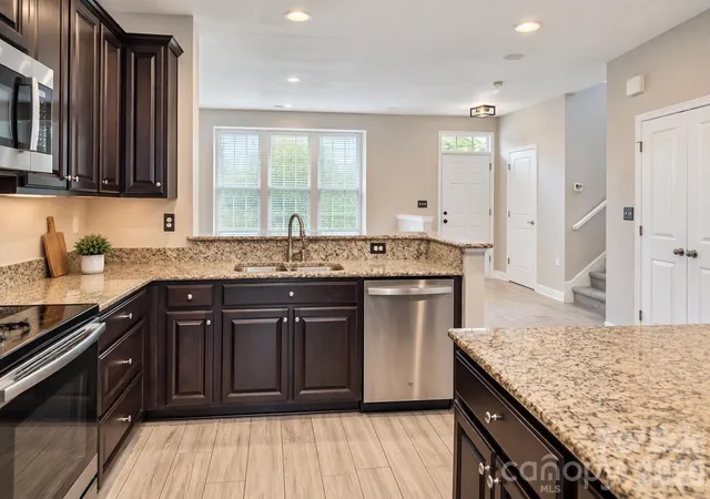 Photo 3 of Townhouse for sale at 1645 Fleetwood Dr, Charlotte, NC 28208 | MLS# 4428546 | Listing updated on 2026-09-28