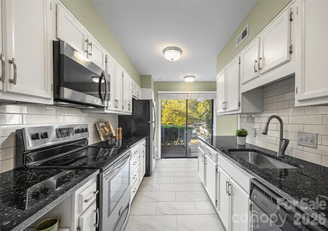 Photo 3 of Condo for sale at 5803 Sharon Rd #E, Charlotte, NC 28210 | MLS# 4428792 | Listing updated on 2026-10-03