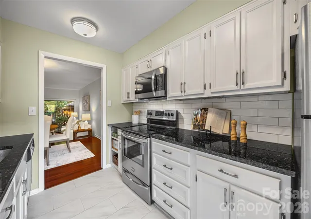 Photo 4 of Condo for sale at 5803 Sharon Rd #E, Charlotte, NC 28210 | MLS# 4428792 | Listing updated on 2026-10-03