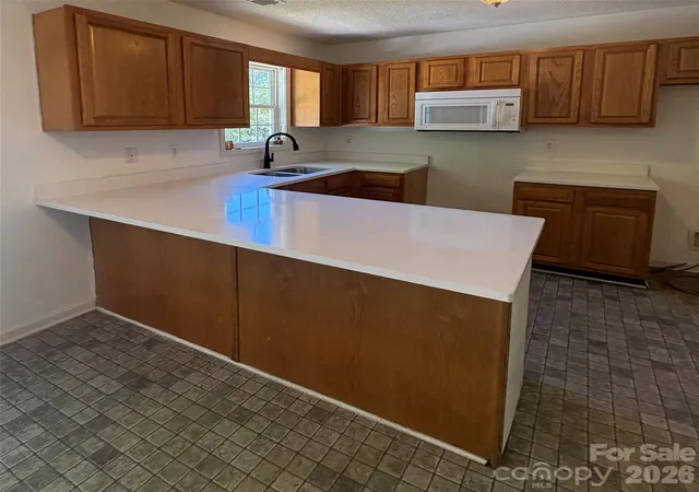 Photo 4 of Single family home for sale at 2430 Sylvan Dr, Asheboro, NC 27203 | MLS# 4428814 | Listing updated on 2026-09-27