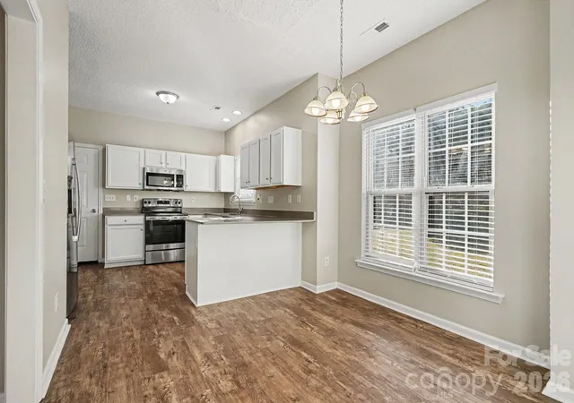 Photo 3 of Single family home for sale at 1009 Sandy Point Dr SW, Concord, NC 28025 | MLS# 4429482 | Listing updated on 2026-10-07