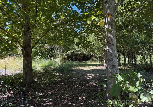 Photo 2 of Land for sale at Lot A Bronco Pass, East Flat Rock, NC 28726 | MLS# 4429558 | Listing updated on 2026-10-01