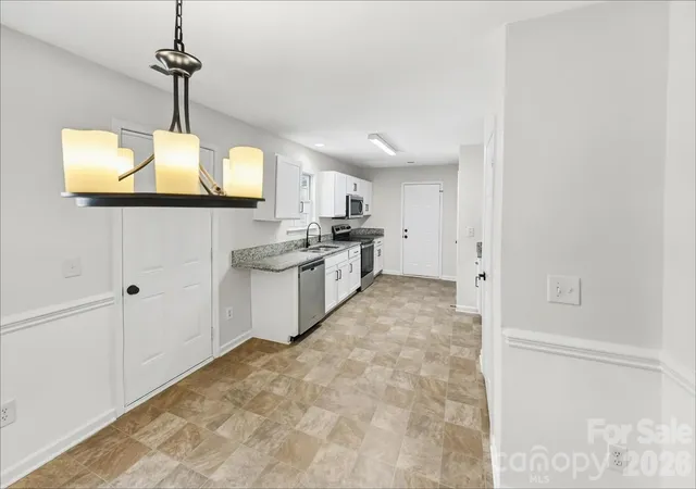 Photo 4 of Single family home for sale at 3139 Reid Brk Ln, Charlotte, NC 28208 | MLS# 4429834 | Listing updated on 2026-10-03