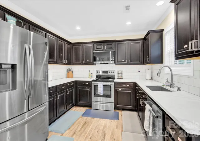 Photo 3 of Single family home for sale at 919 Edgemont Ave, Belmont, NC 28012 | MLS# 4429900 | Listing updated on 2026-09-30