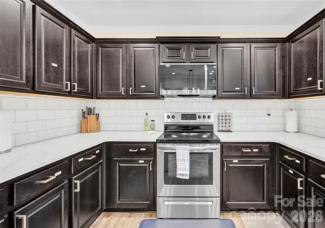 Photo 4 of Single family home for sale at 919 Edgemont Ave, Belmont, NC 28012 | MLS# 4429900 | Listing updated on 2026-09-30