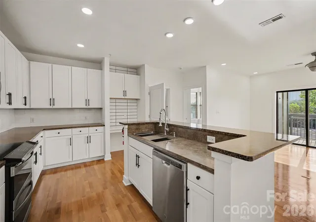 Photo 3 of Condo for sale at 630 Calvert St #301, Charlotte, NC 28208 | MLS# 4430308 | Listing updated on 2026-10-01