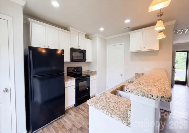 Photo 1 of Single family home for sale at 6130 Loy Ct, Charlotte, NC 28214 | MLS# 4430387 | Listing updated on 2026-10-01