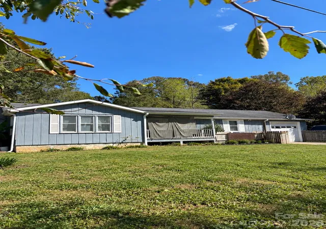 Photo 1 of Single family home for sale at 203 Regan St, East Flat Rock, NC 28726 | MLS# 4430392 | Listing updated on 2026-10-07