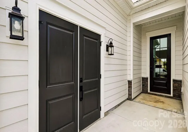 Photo 2 of Single family home for sale at 303 Marina Bay Trl, Locust, NC 28097 | MLS# 4430586 | Listing updated on 2026-10-09