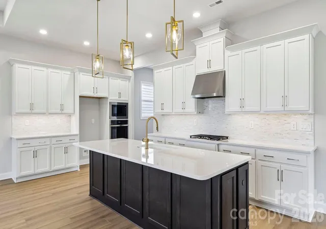 Photo 3 of Single family home for sale at 303 Marina Bay Trl, Locust, NC 28097 | MLS# 4430586 | Listing updated on 2026-10-09