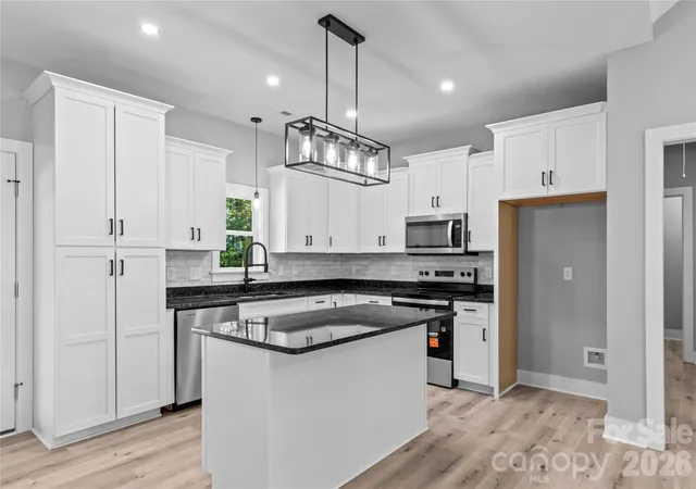 Photo 3 of Single family home for sale at 2303 Frederick Dr, Winston Salem, NC 27103 | MLS# 4430958 | Listing updated on 2026-10-06