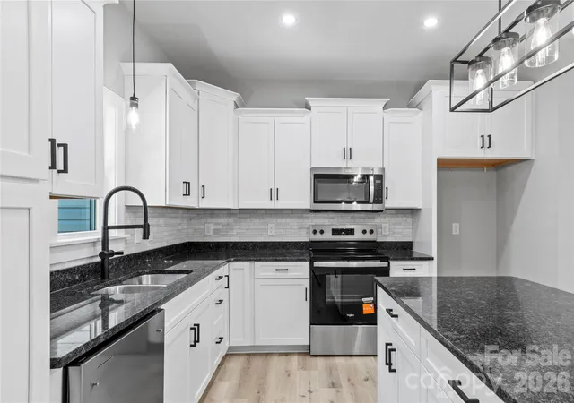 Photo 4 of Single family home for sale at 2303 Frederick Dr, Winston Salem, NC 27103 | MLS# 4430958 | Listing updated on 2026-10-06