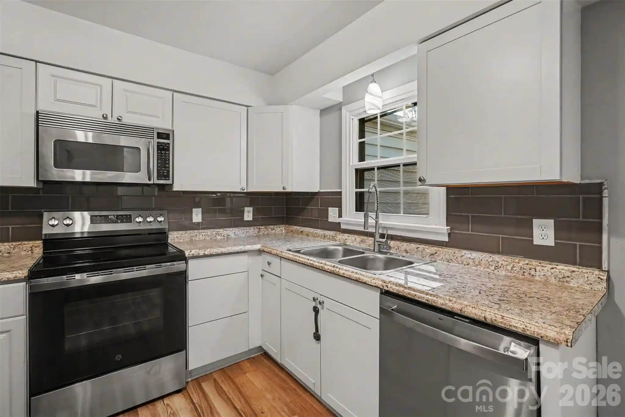 Listing Photo 1 - Condo for sale in 6440 Old Pineville Rd located at 6440 Old Pineville Rd, Charlotte, NC 28217 - Unit 6440 Old Pineville Rd