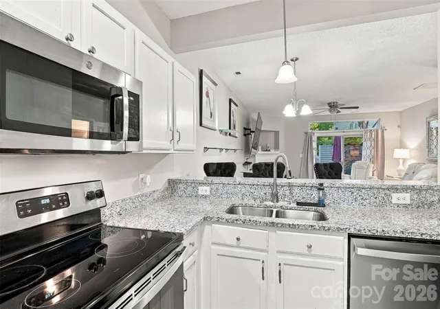 Photo 4 of Townhouse for sale at 8948 Cinnabay Dr, Charlotte, NC 28216 | MLS# 4431694 | Listing updated on 2026-10-28