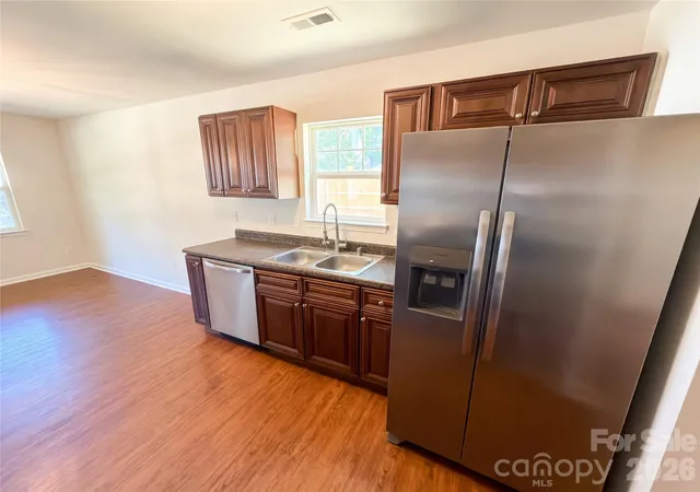 Photo 3 of Single family home for sale at 413 Greenwood Dr, Charlotte, NC 28217 | MLS# 4431801 | Listing updated on 2026-10-07
