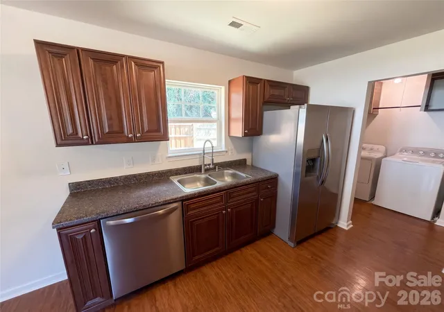 Photo 4 of Single family home for sale at 413 Greenwood Dr, Charlotte, NC 28217 | MLS# 4431801 | Listing updated on 2026-10-07