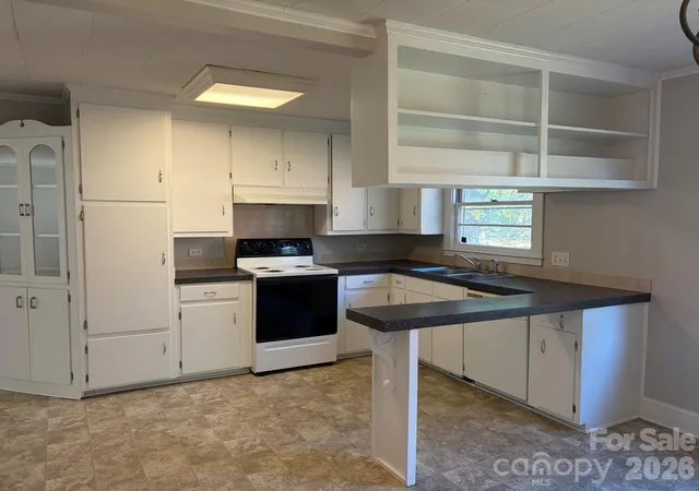 Photo 3 of Single family home for sale at 310 Coggins Ave, Albemarle, NC 28001 | MLS# 4431918 | Listing updated on 2026-10-29