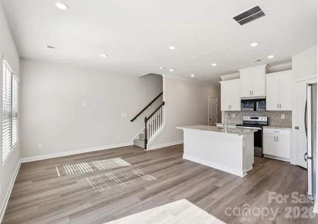 Photo 2 of Townhouse for sale at 8009 Hidden Springs Trl, Charlotte, NC 28216 | MLS# 4432085 | Listing updated on 2026-10-07