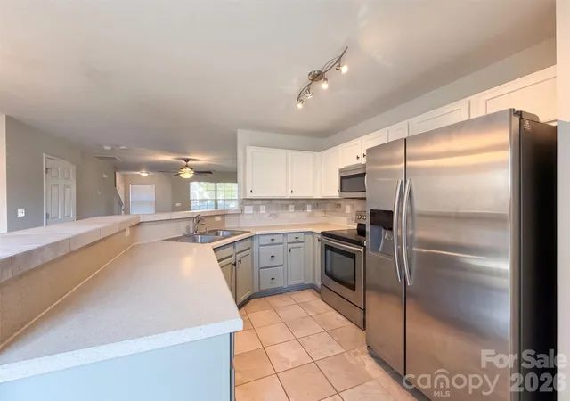 Photo 2 of Townhouse for sale at 10523 Trolley Run Dr, Cornelius, NC 28031 | MLS# 4432186 | Listing updated on 2026-10-07