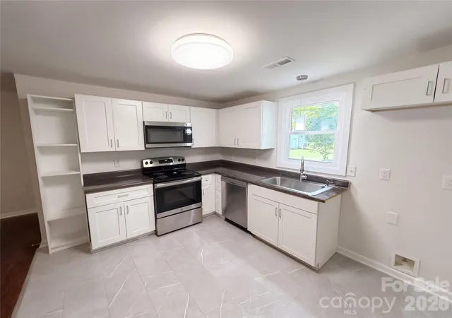 Photo 3 of Single family home for sale at 232 River St, Mount Holly, NC 28120 | MLS# 4432297 | Listing updated on 2026-10-07