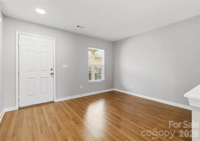 Photo 3 of Single family home for sale at 6215 Woodland Cmns Dr, Charlotte, NC 28269 | MLS# 4432348 | Listing updated on 2026-10-07