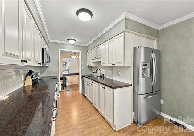 Photo 2 of Condo for sale at 5805 Sharon Rd #E, Charlotte, NC 28210 | MLS# 4432363 | Listing updated on 2026-10-09