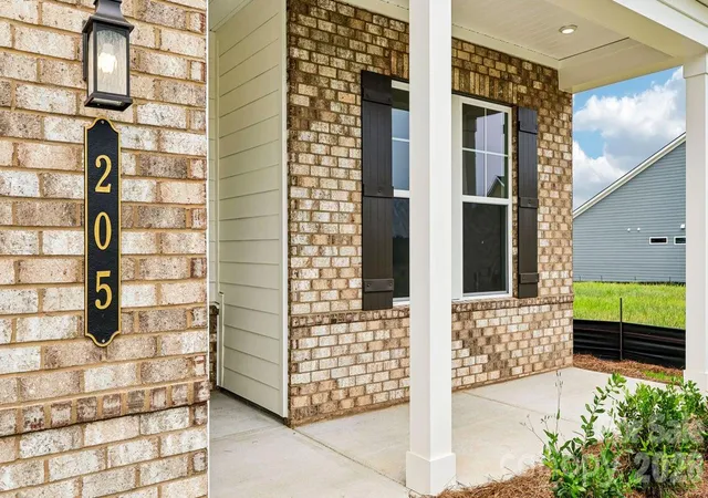 Photo 2 of Single family home for sale at 205 Marina Bay Trl, Locust, NC 28097 | MLS# 4432490 | Listing updated on 2026-10-09
