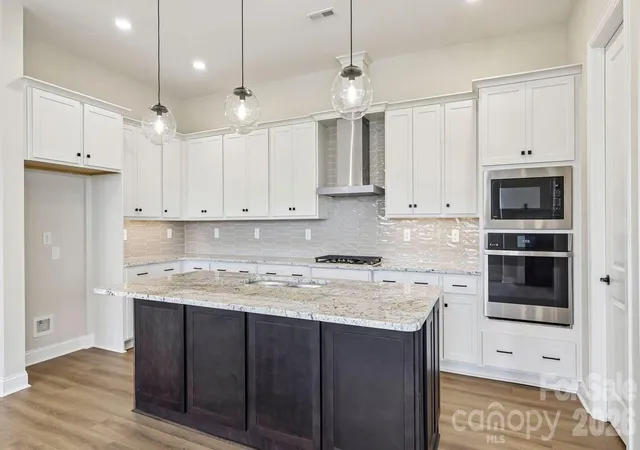 Photo 4 of Single family home for sale at 205 Marina Bay Trl, Locust, NC 28097 | MLS# 4432490 | Listing updated on 2026-10-09