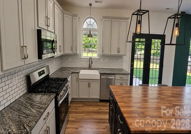Photo 3 of Single family home for sale at 4954 Riverview Dr, Harrisburg, NC 28075 | MLS# 4432620 | Listing updated on 2026-10-08