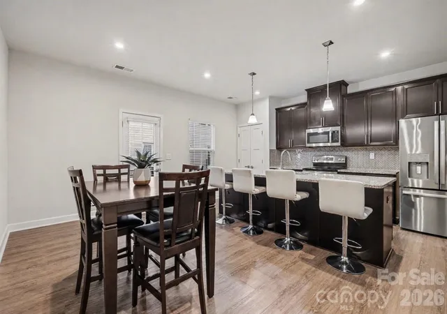 Photo 2 of Townhouse for sale at 1305 Newell Towns Ln, Charlotte, NC 28262 | MLS# 4432831 | Listing updated on 2026-10-24