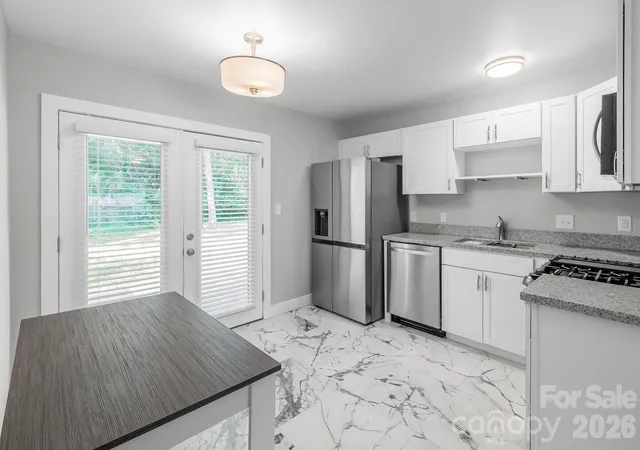 Photo 4 of Condo for sale at 3105 Erskine Dr #49, Charlotte, NC 28205 | MLS# 4432859 | Listing updated on 2026-10-08