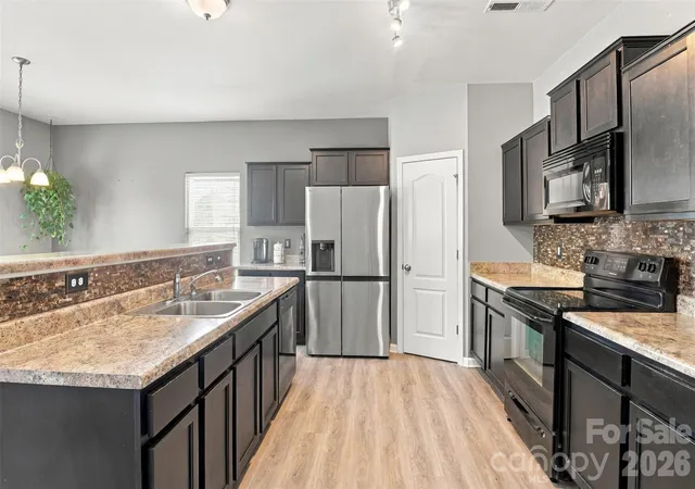 Photo 4 of Single family home for sale at 11228 Deer Chase Ln, Charlotte, NC 28262 | MLS# 4432965 | Listing updated on 2026-10-24
