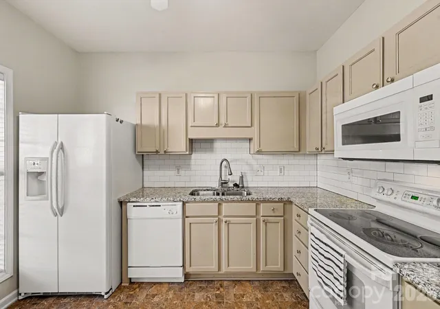 Photo 3 of Townhouse for sale at 8334 Carob Tree Ln, Charlotte, NC 28215 | MLS# 4433517 | Listing updated on 2026-10-23