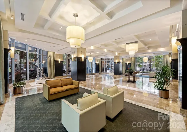 Listing Photo 1 - Condo for sale in building located at 230 S Tryon St, Charlotte, NC 28202 - Unit #1105