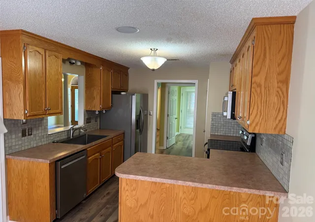 Photo 2 of Single family home for sale at 204 Silver Birch Ln, Mount Holly, NC 28120 | MLS# 4434202 | Listing updated on 2026-10-20