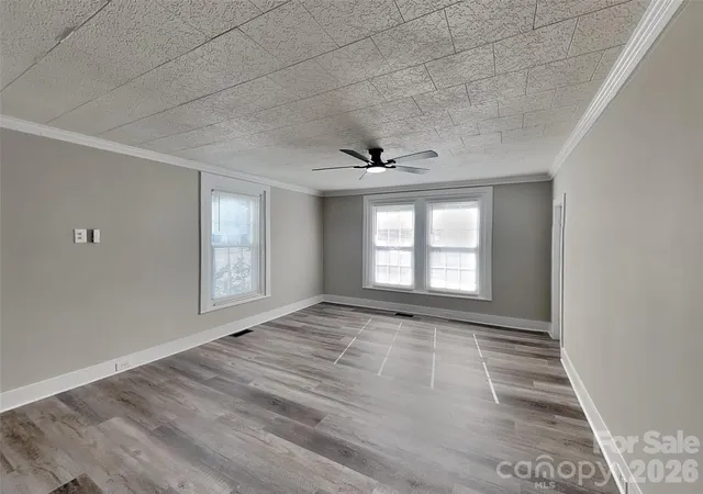 Photo 3 of Single family home for sale at 313 Bruce Ave, Mooresville, NC 28115 | MLS# 4434321 | Listing updated on 2026-10-14