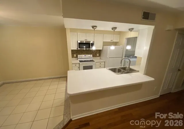 Listing Photo 1 - Condo for sale in building located at 11013 Running Ridge Rd, Charlotte, NC 28226