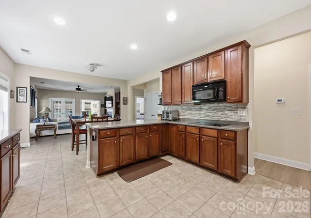 Photo 3 of Single family home for sale at 4405 Squirrel Trl Ln, Charlotte, NC 28269 | MLS# 4434681 | Listing updated on 2026-10-31